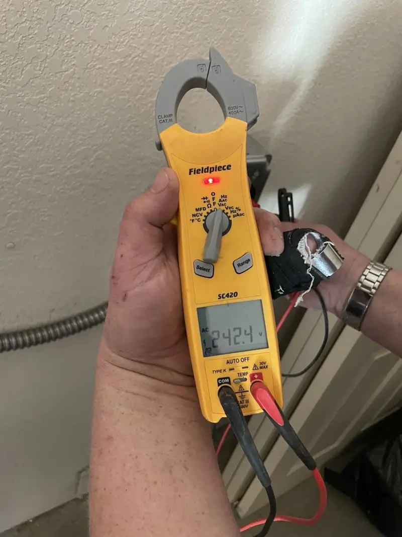Voltage testing with clamp meter during Generator Installation in Morganton
